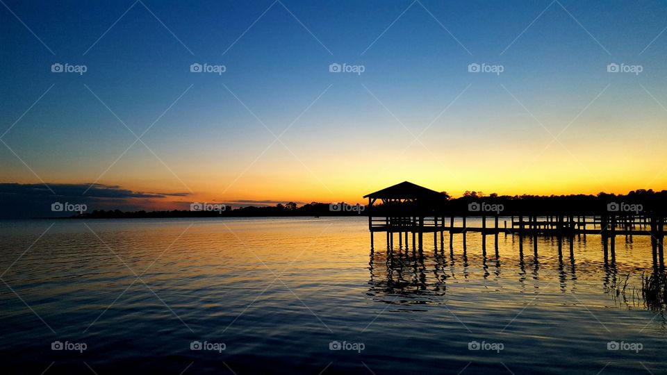 Sunset and a pier.