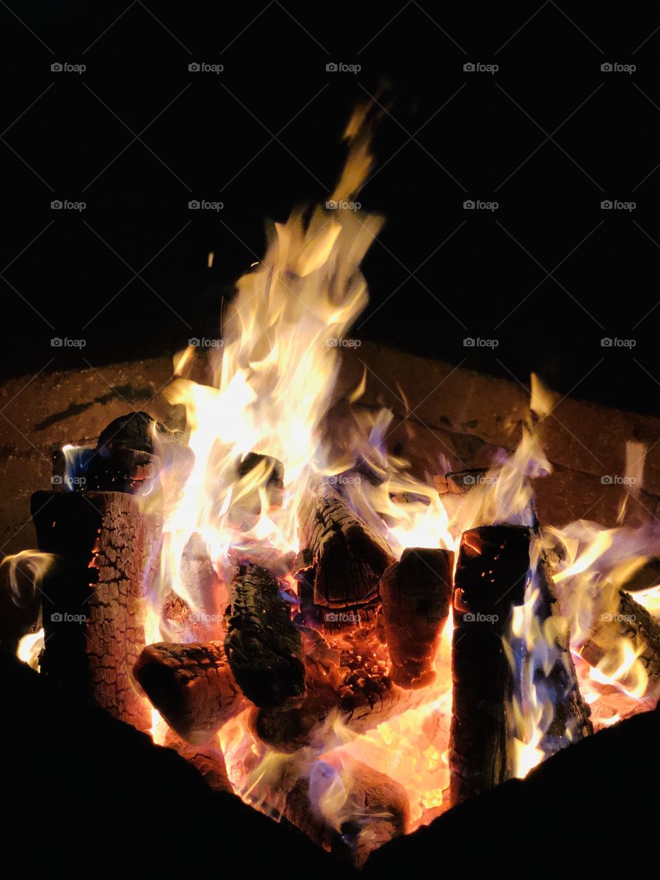 A roaring backyard fire keeps us warm on a December night in Minnesota.