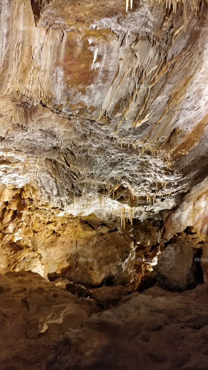 Drip by drip an ancient pattern grows and adorns the walls of the underground kingdom.