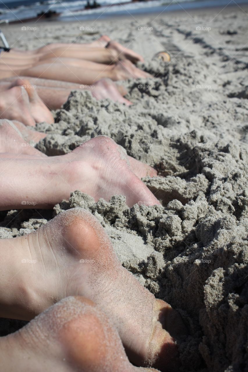 Feet in the sand