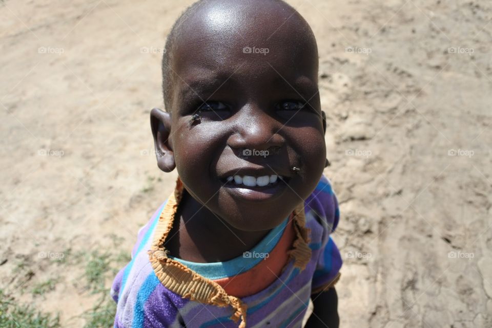 Massai Child. A Massai child covered in flies