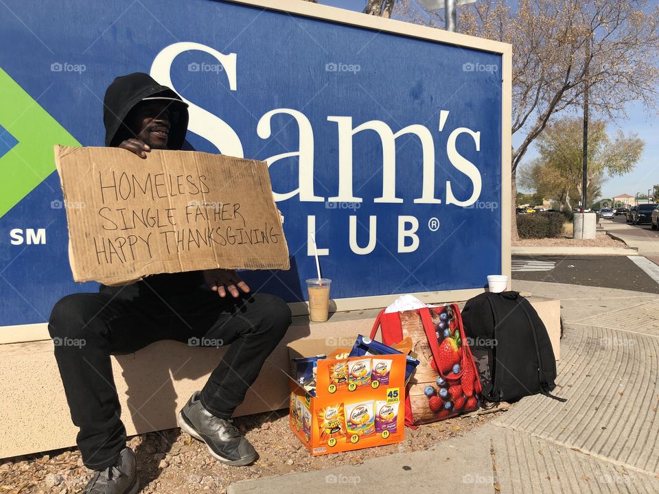 Single father just trying to get a turkey for him and his boy... it looks like Sam’s club hooked up the bags of Fritos, and Cheetos, and all the different to’S chips. Go SC!!! Buy in bulk or don’t buy at all ;)(: Homeless not by choice. By Chance