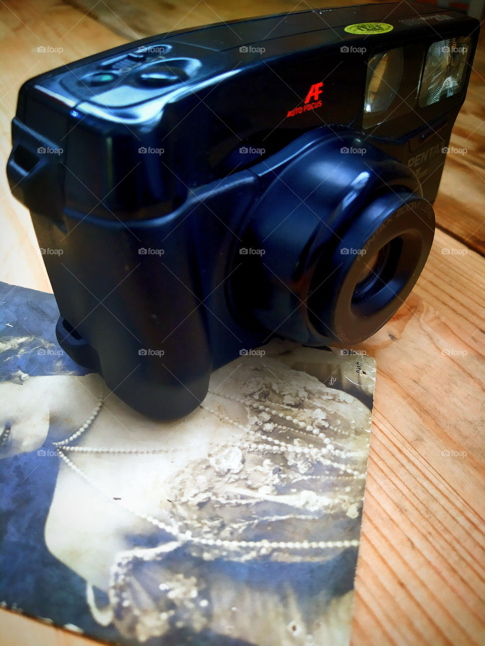 Camera and old photo