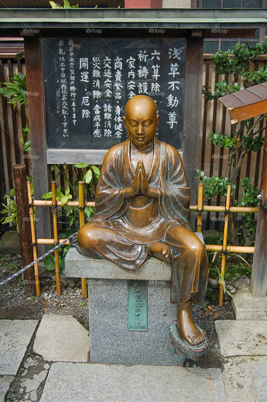 Bronze Buddha Statue At Sensoji Temple Tokyo Japan