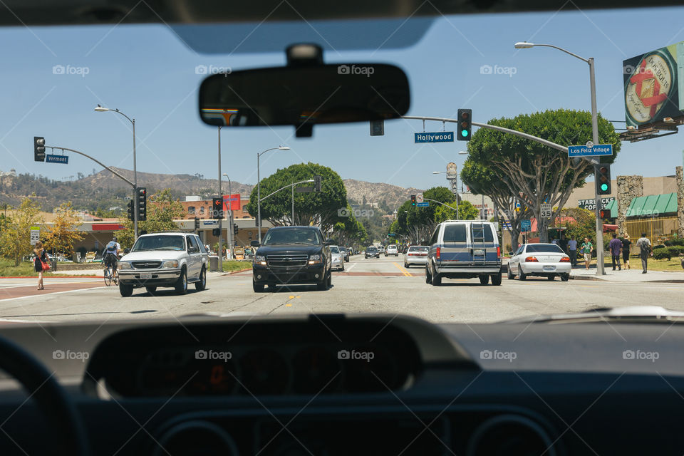 Driving on Hollywood blvd in Los Angeles view from the car windshield 