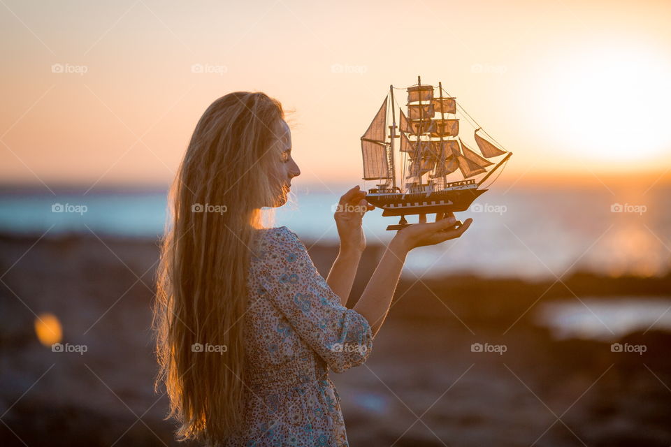 Portrait of beautiful young woman at outdoor