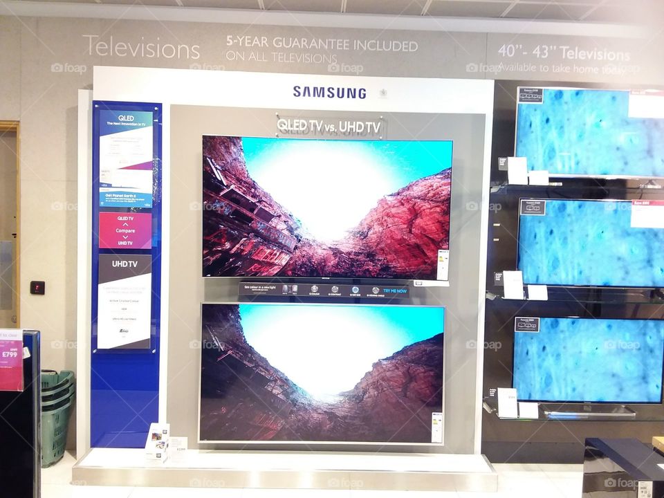 Samsung Armoire comparison wall mounted televisions 4K Ultra High Definition Indoors, No Person