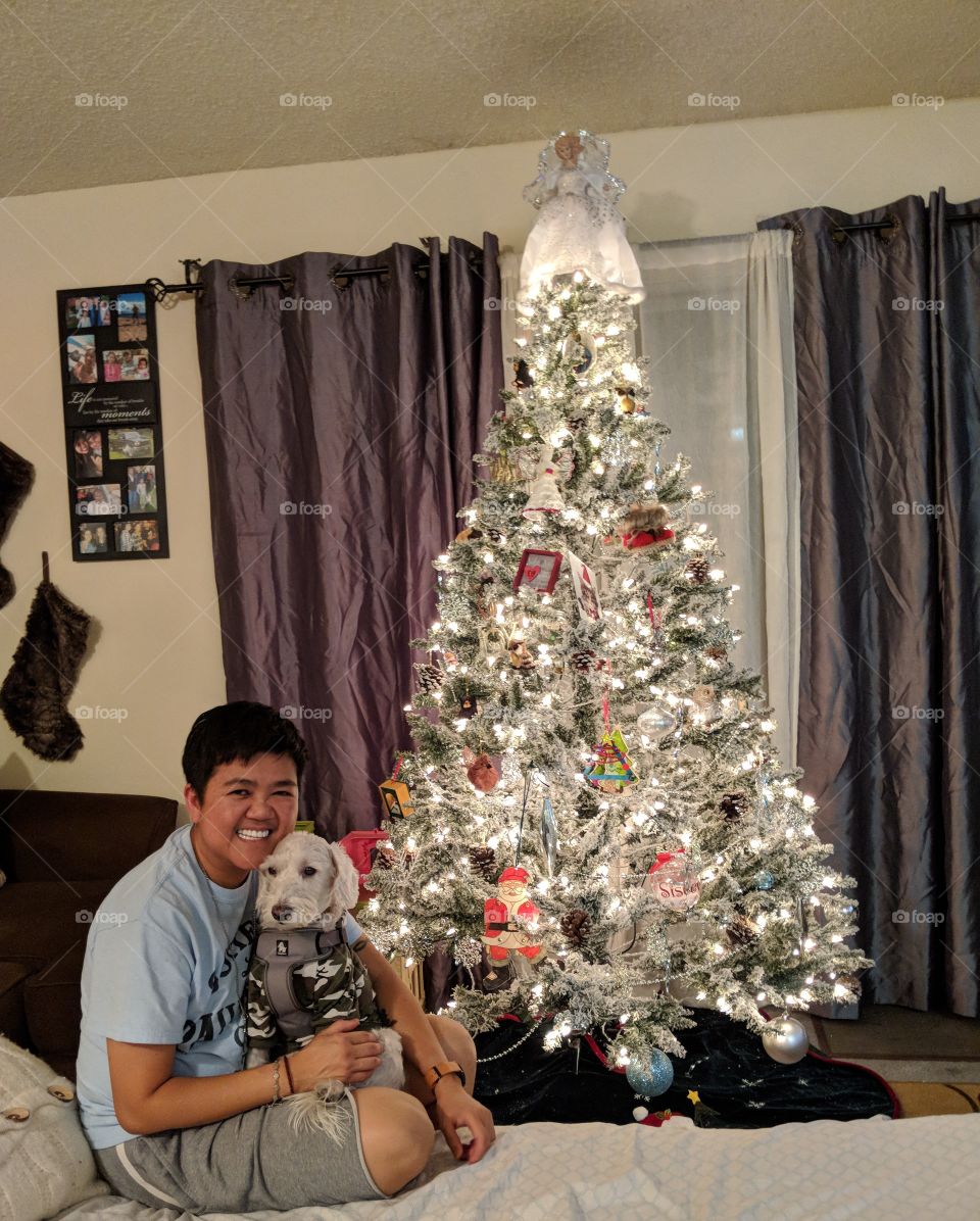 my sad dog and empty Christmas tree but still smiling..