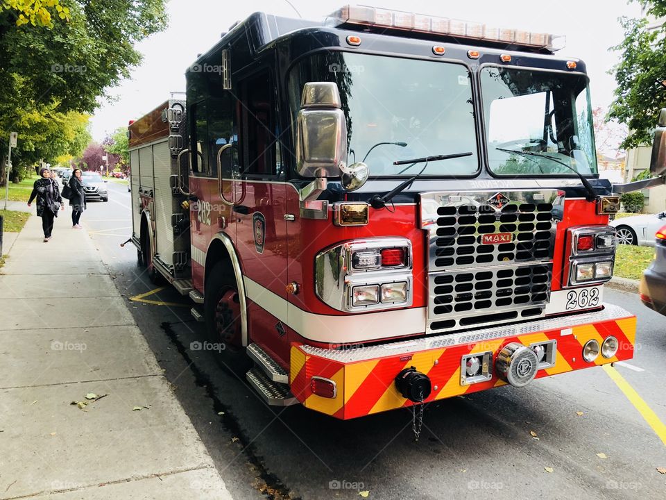 A fire truck in Montréal Quebec Canada parked close look.