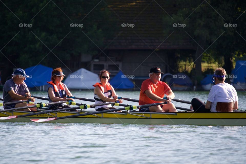 People Having Fun Rowing