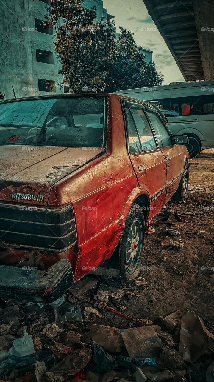 a car that has been parked for a long time.