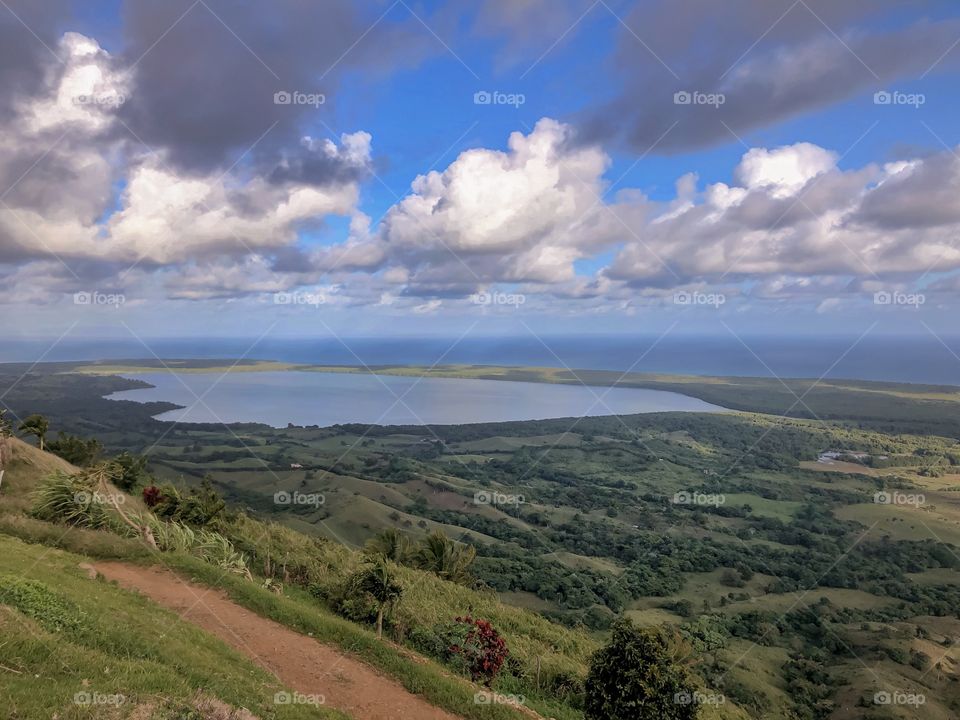 Beautiful mountain view of the lake and the sea on the horizon