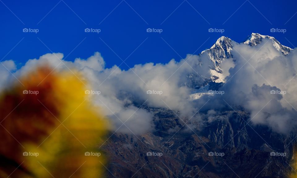 first signs of autumn over mountains