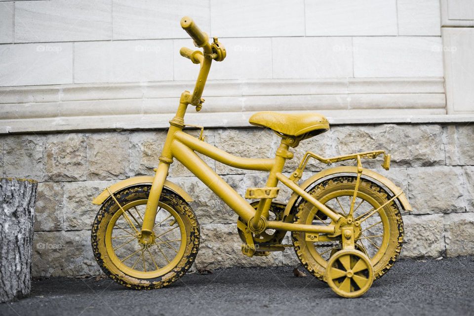Yellow bicycle as decorative element