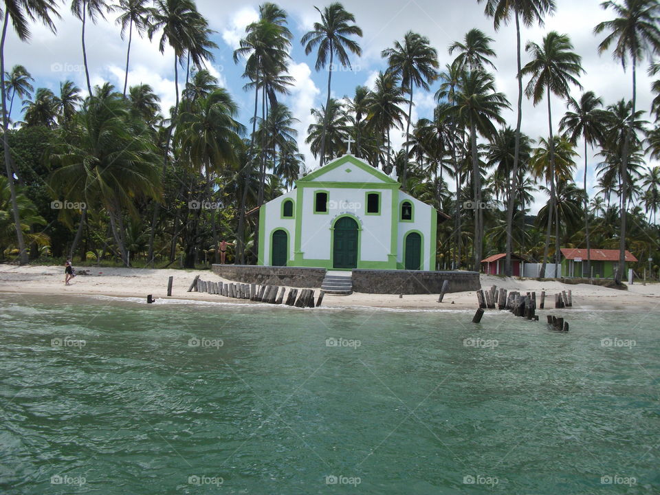 Front view of a church built in theiddle of a deserted beach