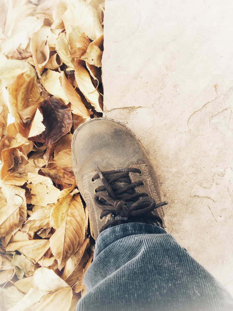 Close up of leg and shoe in the garden 