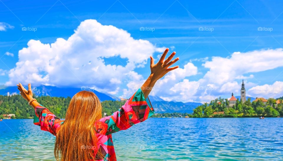 Happy traveler at amazing landmark of Bled