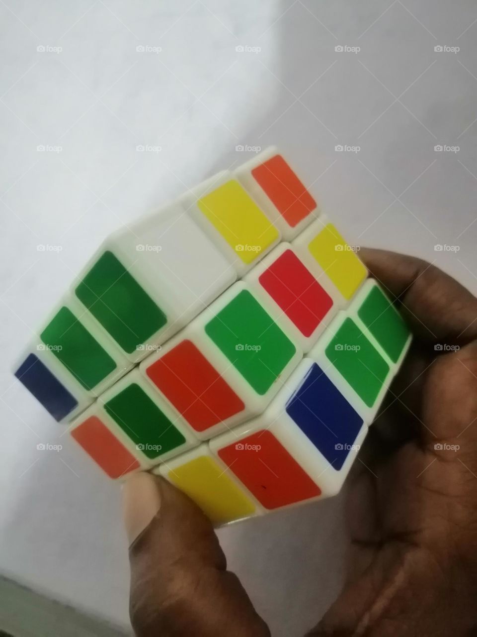let's play colour cubes with  brown hand