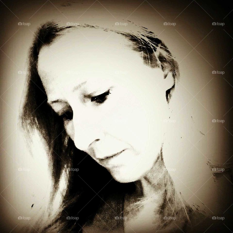 Black and white contemplation portrait.