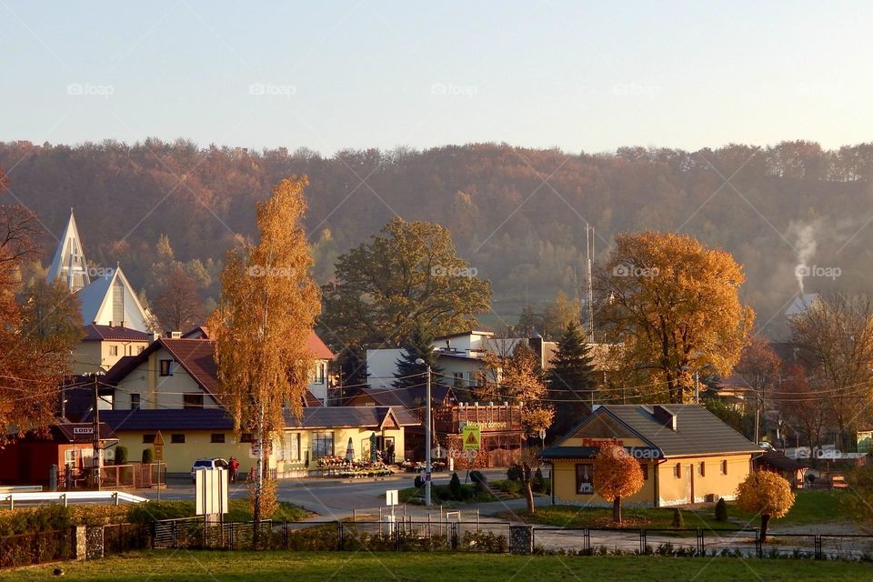 Fall in country, golden autumn in suburb, Poland