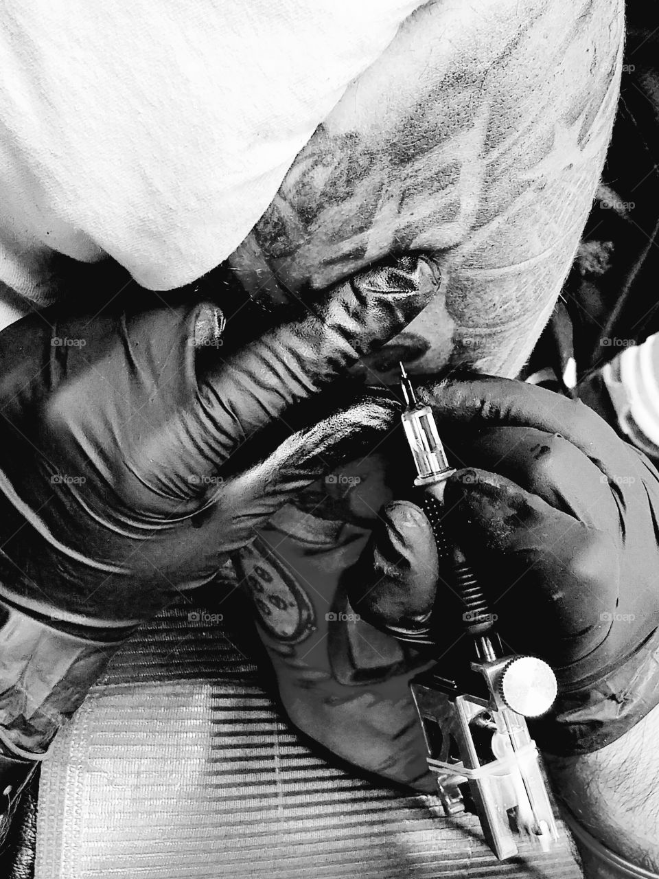 My best friend getting his tattoo sleeve finished.