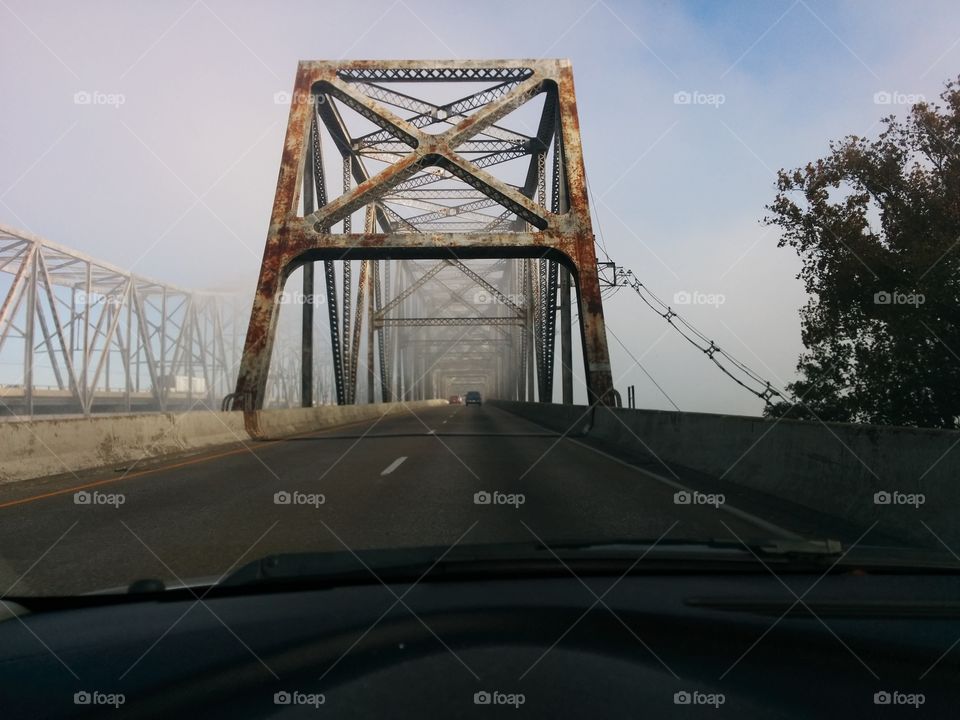 rusting steal bridge foggy