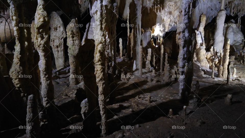 A dark underground cave in Romanian mountains