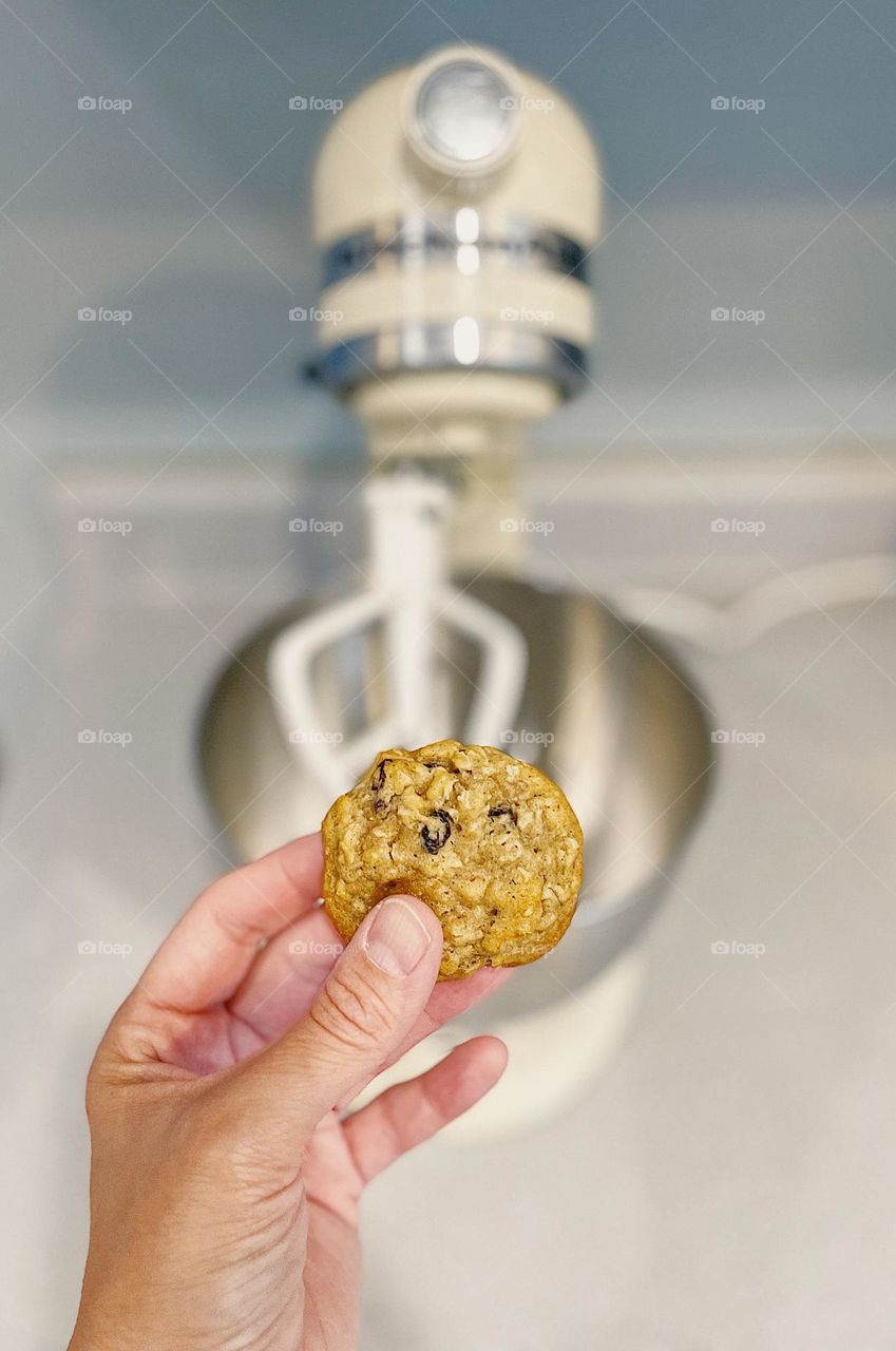 Small moments of happiness baking cookies, mother bakes cookies at home, making homemade oatmeal raisin cookies, using a KitchenAid mixer to make cookies, eating cookies 