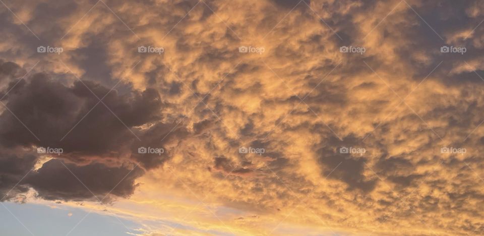 Golden colored clouds.