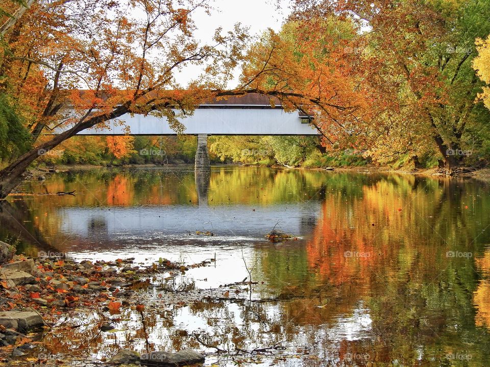 Fall day with the river and covered bridge in Indiana 
