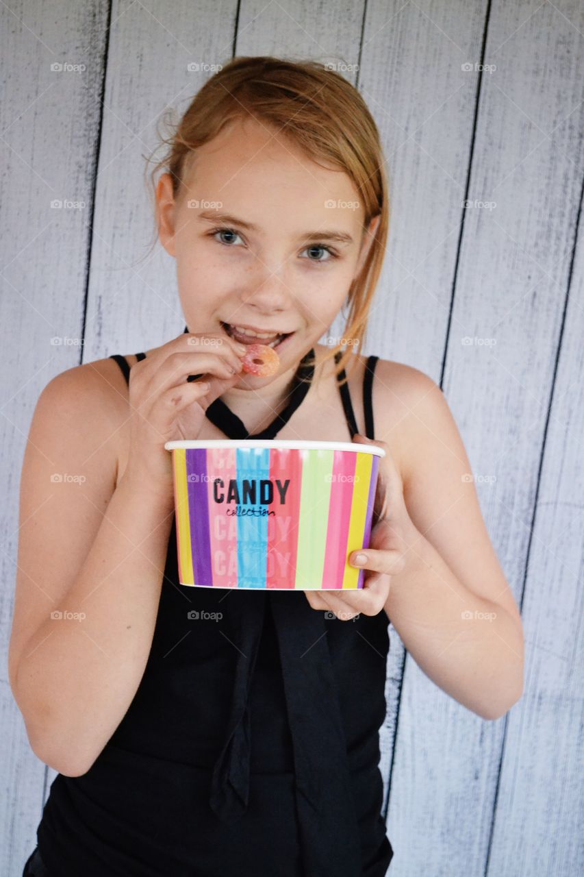 Girl eating candy