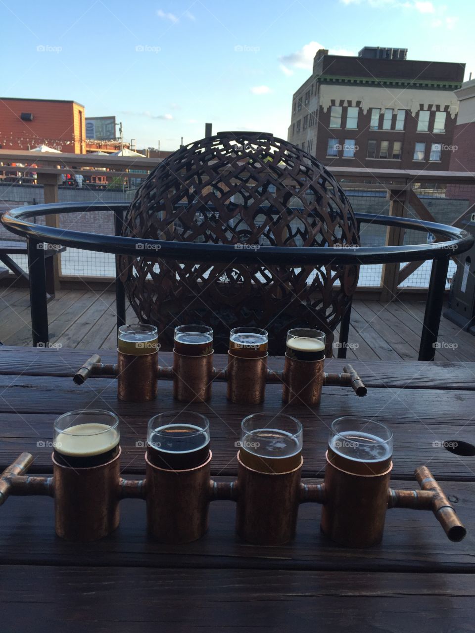 Flights of beer on city rooftop bar