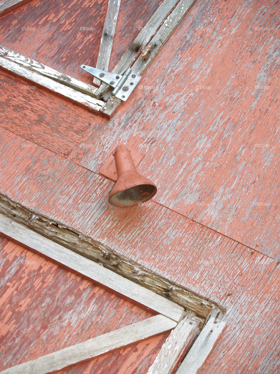 Spotlight on a Weathered Red Barn