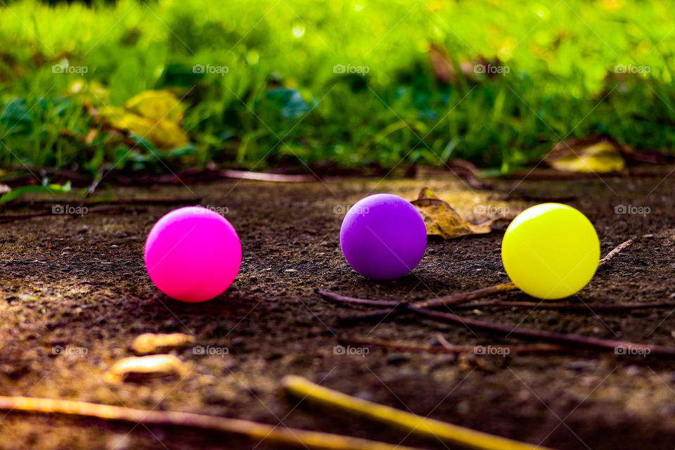 Three different color of pingpong balls.
