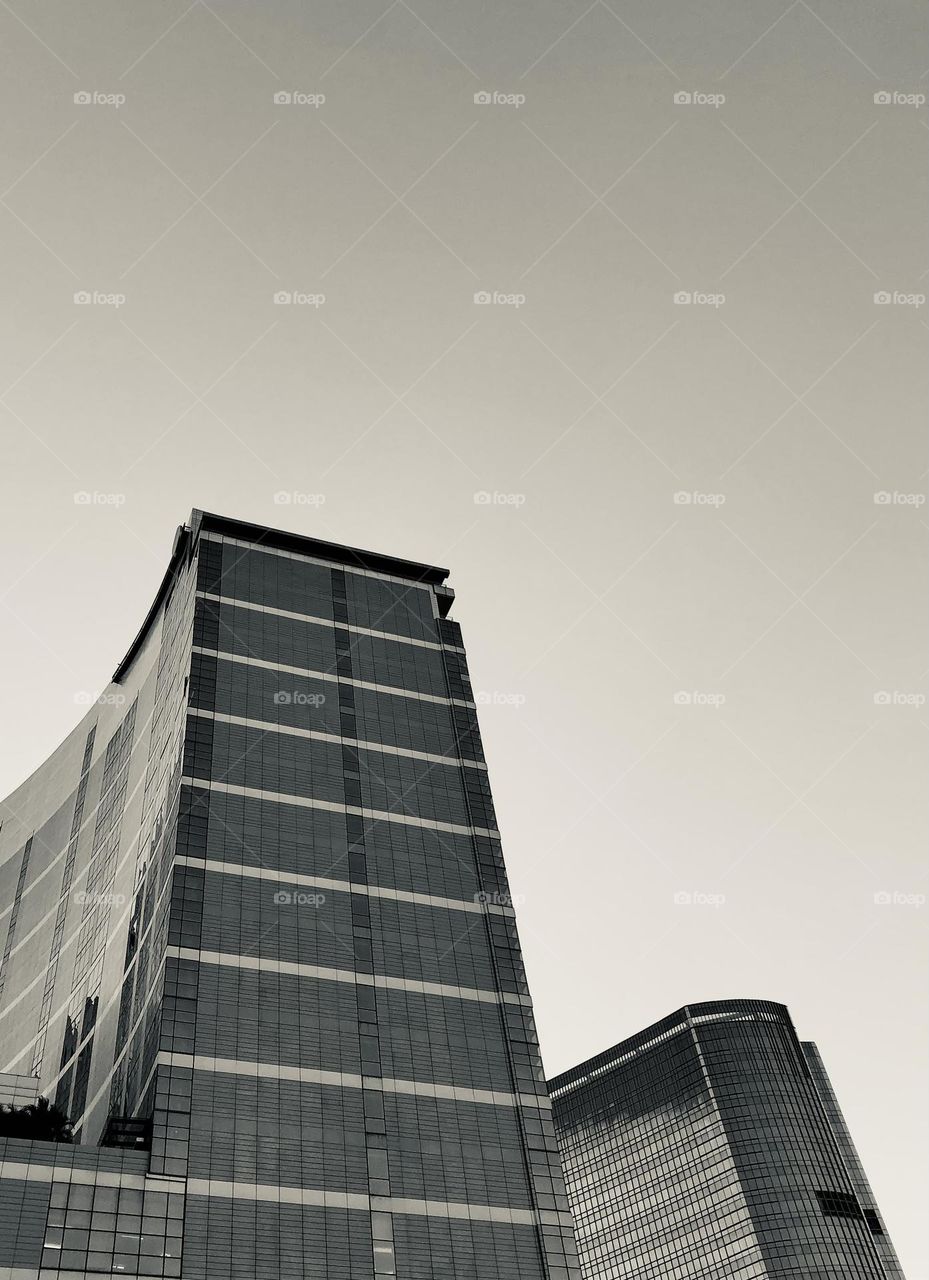 A big office building in Jakarta, Indonesia. Black and white version.