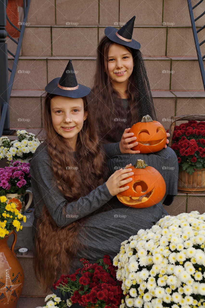 Girls with pumpkins