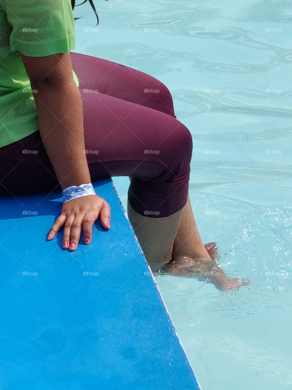 dip your feet in that cool water of the pool and relax. it's summer time !