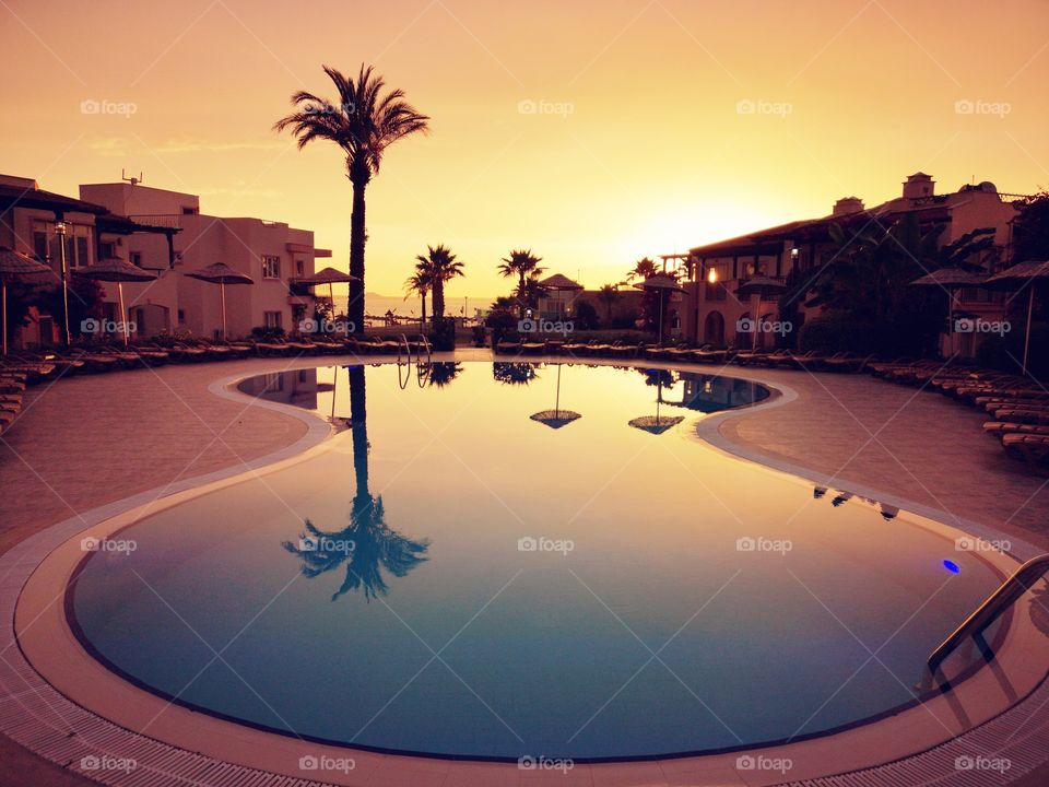 Swimming pool at sunset.