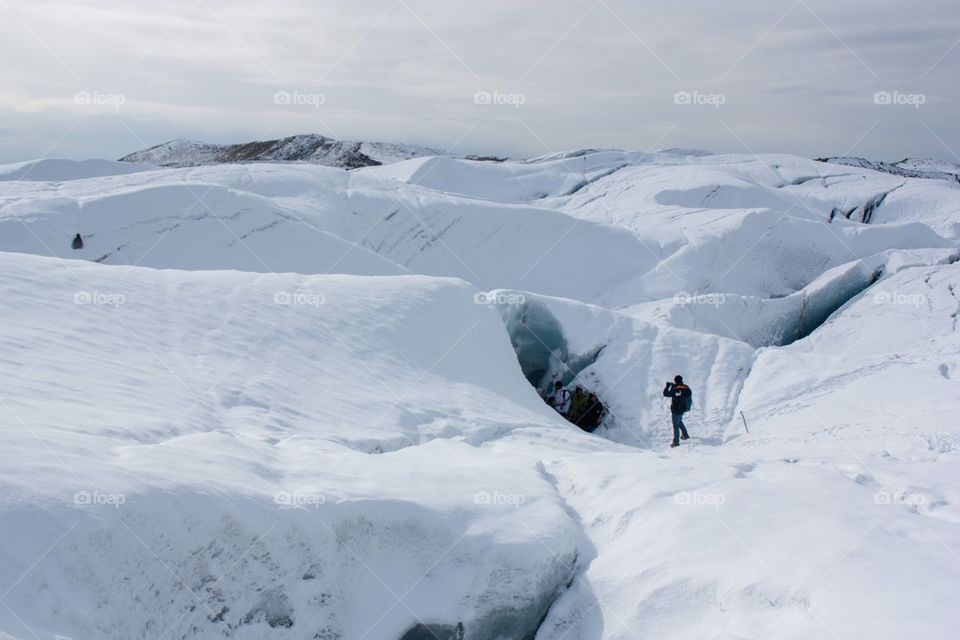 Person walking in snowy landscape