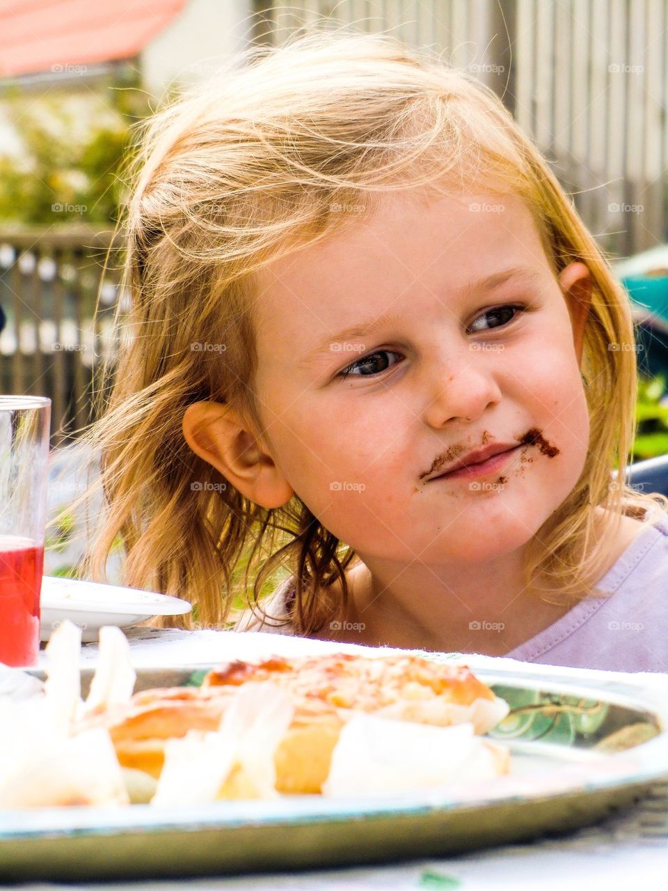 Sweet girl eating sweets