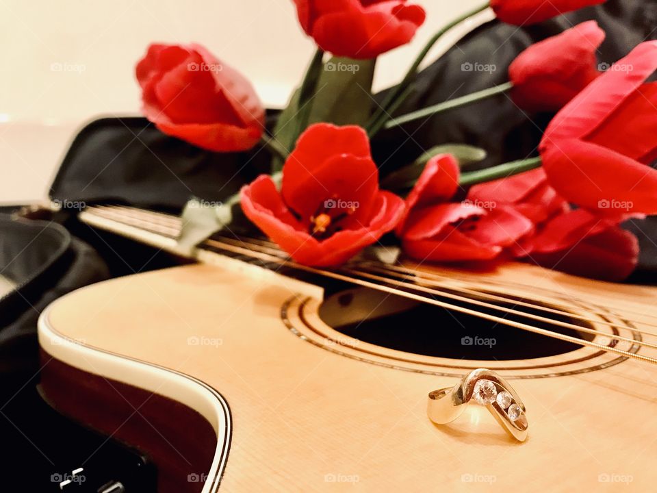 Taking a weekend getaway to propose to the love of my life by serenading her with my guitar! 