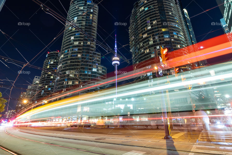 Light trails from traffic on a city street during an evening commute in a big city. Toronto Cityscape