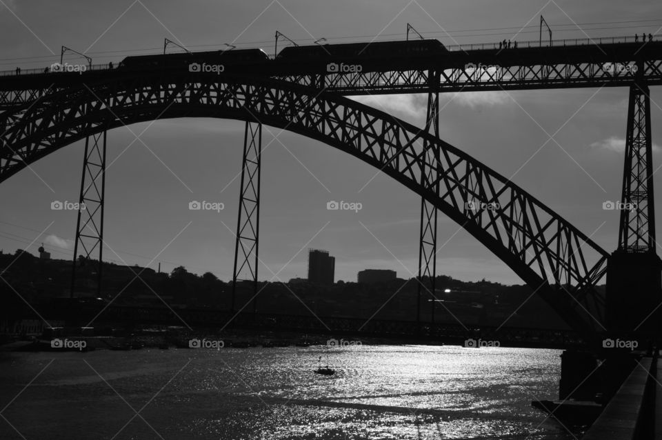 Luis bridge in Porto reflected on the Douro river