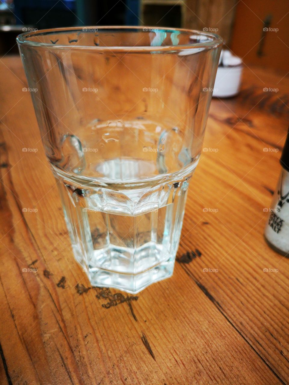Glass of water on wood table