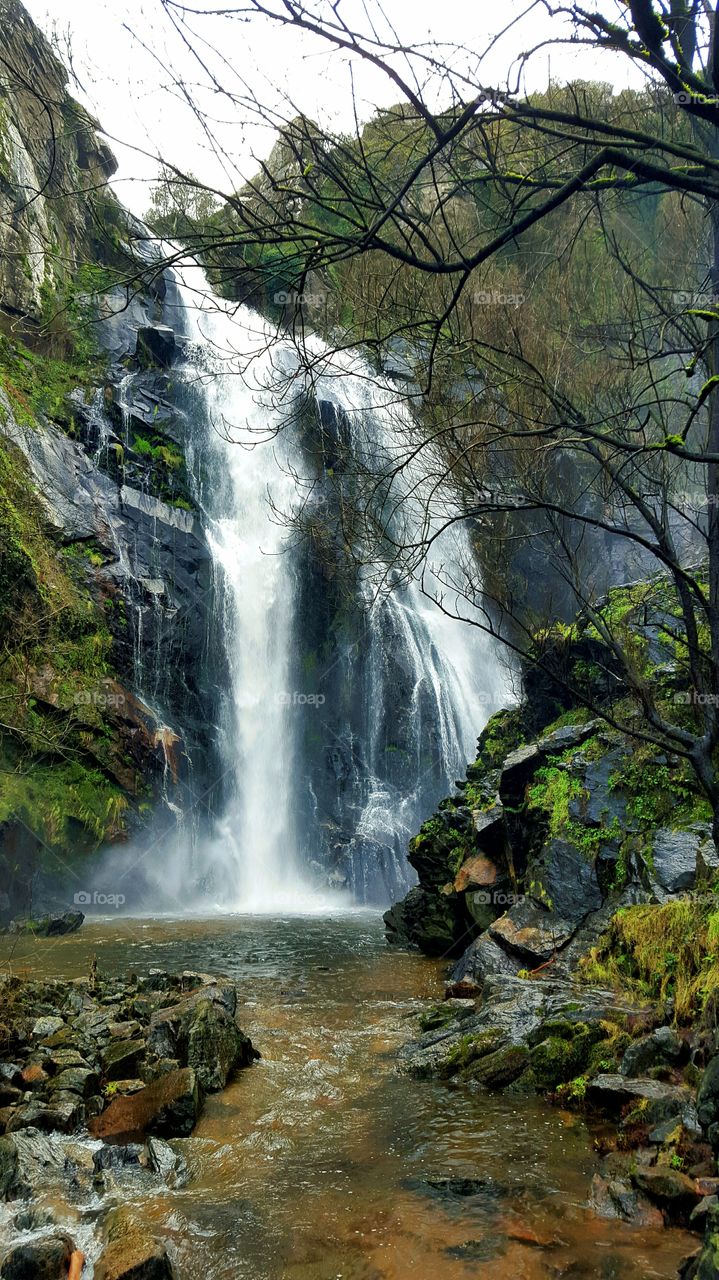 Waterfall at river Toxa, Galicia, Spain.