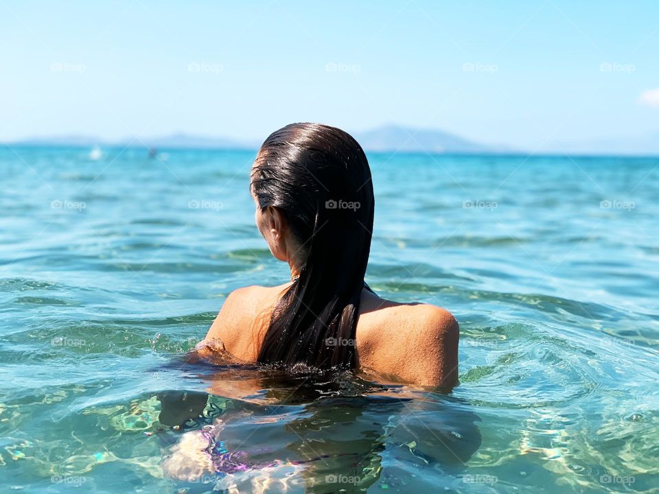 Swimming in the blue sea 