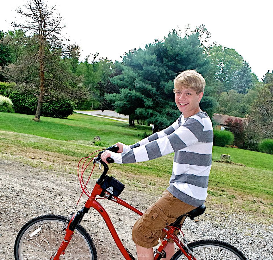 Younger me on a bike.