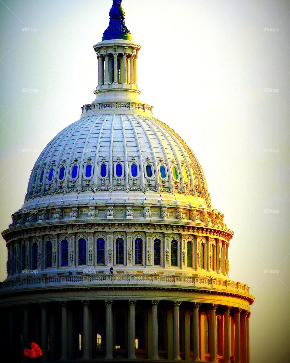 US Capitol dome at sunrise.