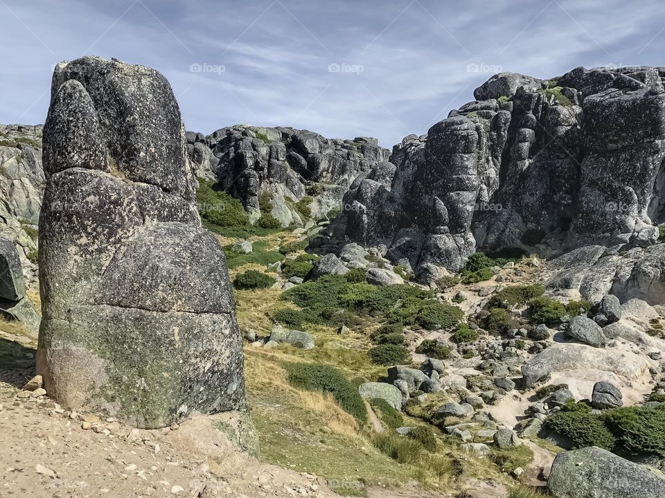 Large granite boulders create a dramatic landscape at Serra Da Estrela National Park, Portugal 