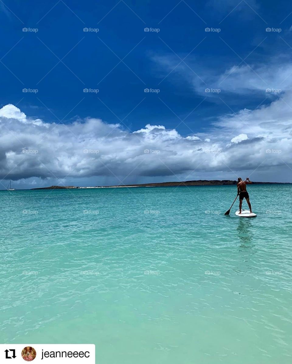 Middle of a sea, a beautiful natural area of the sea and the sky with snow
